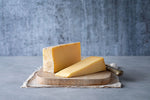 Load image into Gallery viewer, Cave Aged Cheddar Cheese, Wookey Hole (650g)
