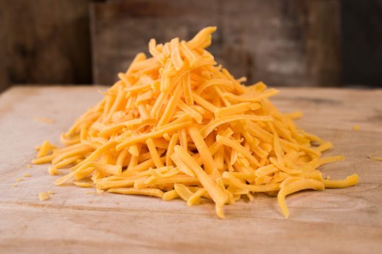 Coloured Mild Cheddar Grated 2 kg - Capital Wholesalers